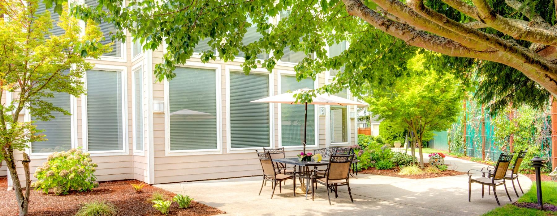 a house with a patio and chairs